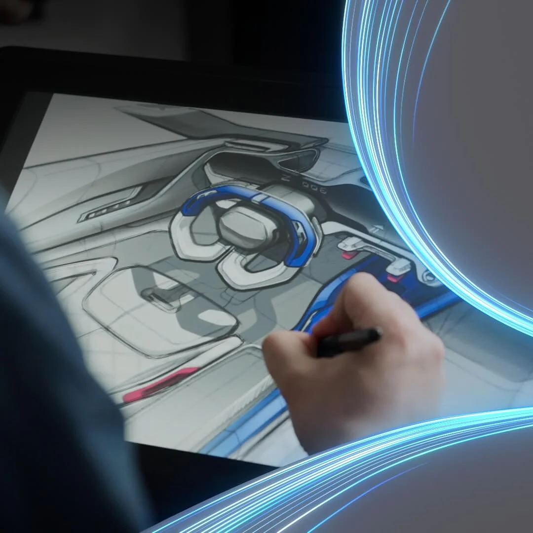 A person is sketching a futuristic car dashboard on a digital tablet. The design features a steering wheel, digital displays, and modern panels. Blue curved lines are overlaid near the images edge with tesa tape, adding a dynamic effect. (This text has been generated by AI)