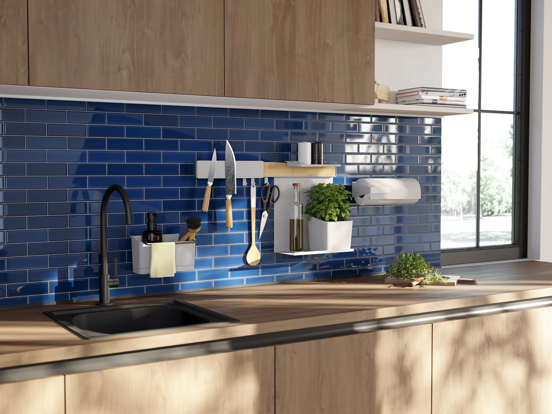 A modern kitchen with a wooden countertop and a black sink. The backsplash features glossy blue subway tiles. Utensils, a knife set, and herbs are neatly organized on a rail with tesa tape, while sunlight streams through a nearby window. (This text has been generated by AI)