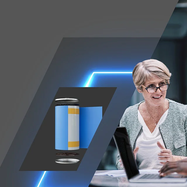 A businesswoman and a businessman are talking at a table with a laptop. To the left, images of a battery and a construction site are integrated into the design. The background is predominantly gray with blue geometric accents. (This text has been generated by AI)