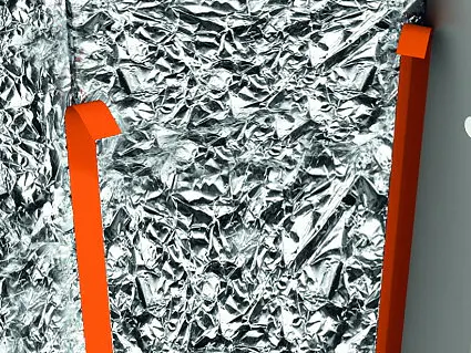 tesa branded orange plastic hooks attached to crinkled reflective insulation material indoors (This text has been generated by AI)