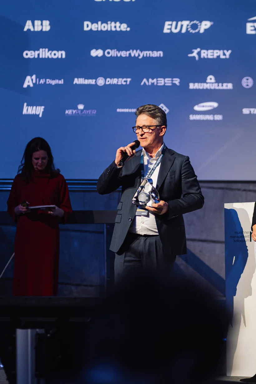 CEO Dr. Norman Goldberg accepts the MMK Award of Excellence in the "Sustainable Engineering" category for tesa's "Debonding on Demand" technology.