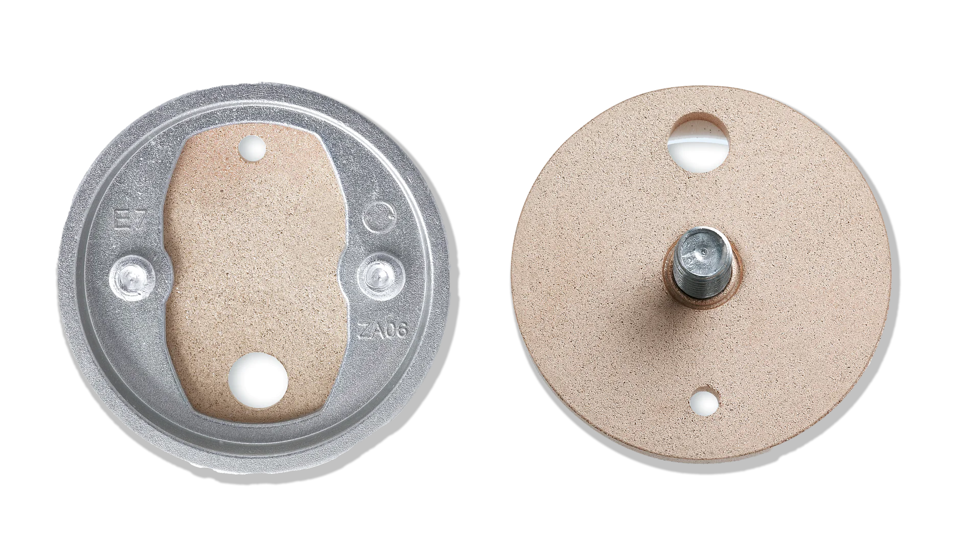 Two circular abrasive discs, one with a metal backing and the other with a central bolt. The back of the left disc has a concave metal surface with markings, while the right disc features a textured abrasive surface with a bolt protruding. (This text has been generated by AI)