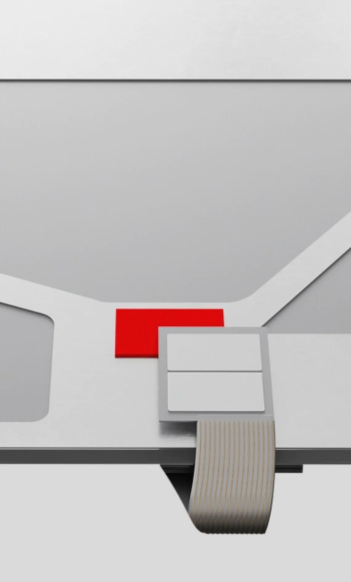 A close-up of a gray electronic device with a red square, and a flat gray connector with tesa tape-wrapped ribbon cable at the bottom. (This text has been generated by AI)