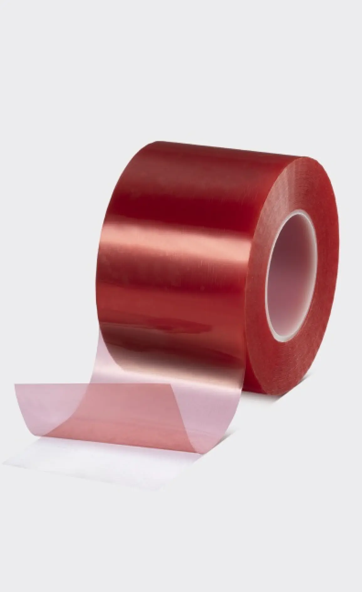 A roll of red tesa tape with a section partially unrolled, placed on a plain light gray background. (This text has been generated by AI)