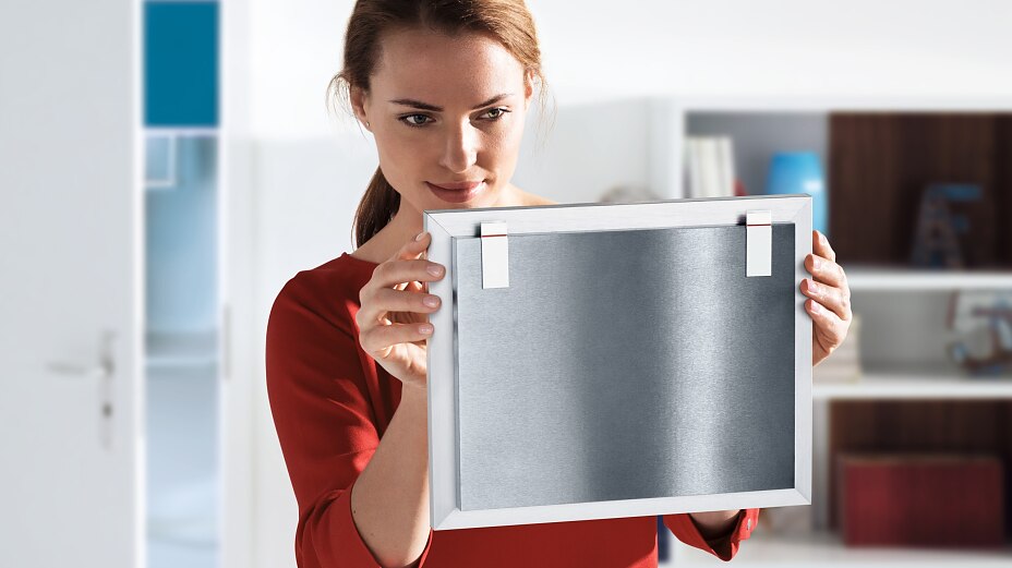 tesa® Powerstrips Resistentes tiras adhesivas removibles de montaje para colgar objetos de la casa directamente en la pared.