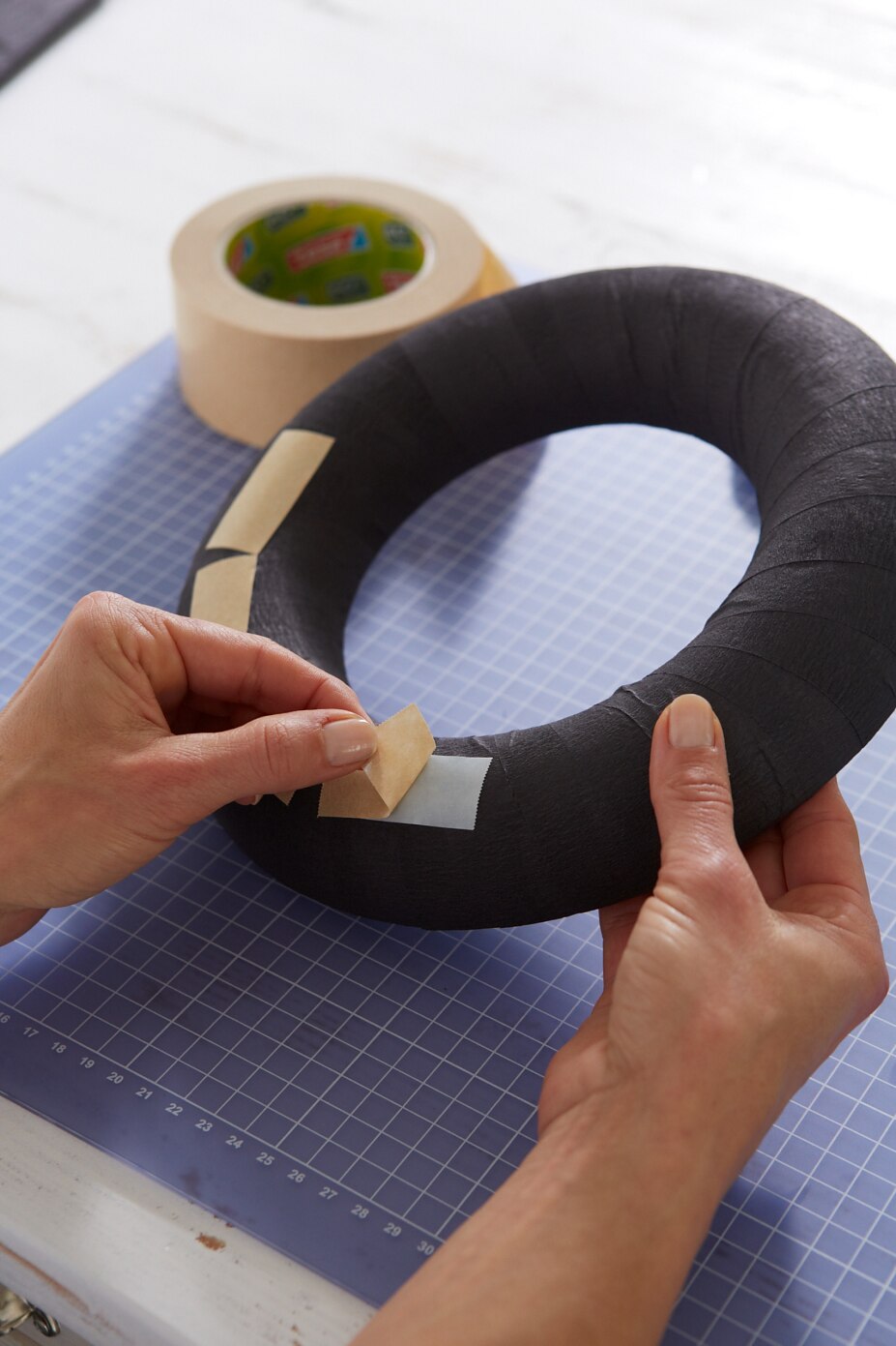 Stick on Tape - Step 04 Stick on double-sided adhesive tape.