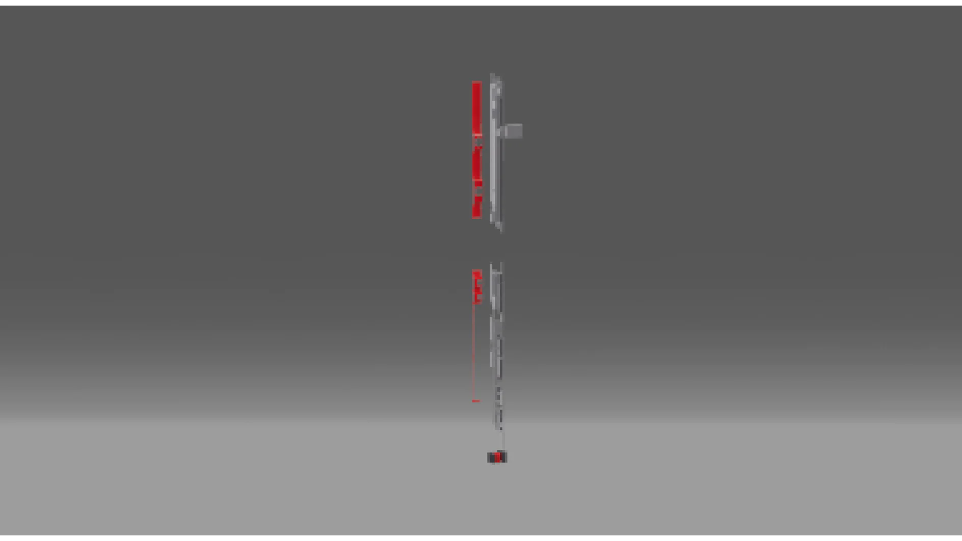 Una estructura alta y delgada con segmentos verticales rojos y grises se encuentra sobre una superficie gris frente a un fondo más oscuro. La estructura parece tener componentes rectangulares con algunos elementos salientes, unidos de manera segura con cinta tesa para una sujeción confiable. (This text has been generated by AI)