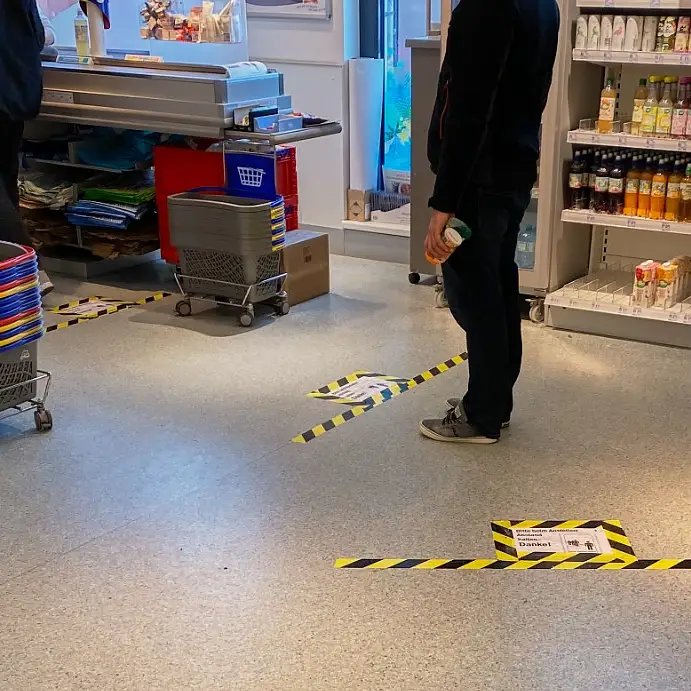 social-distancing-tape-supermarket