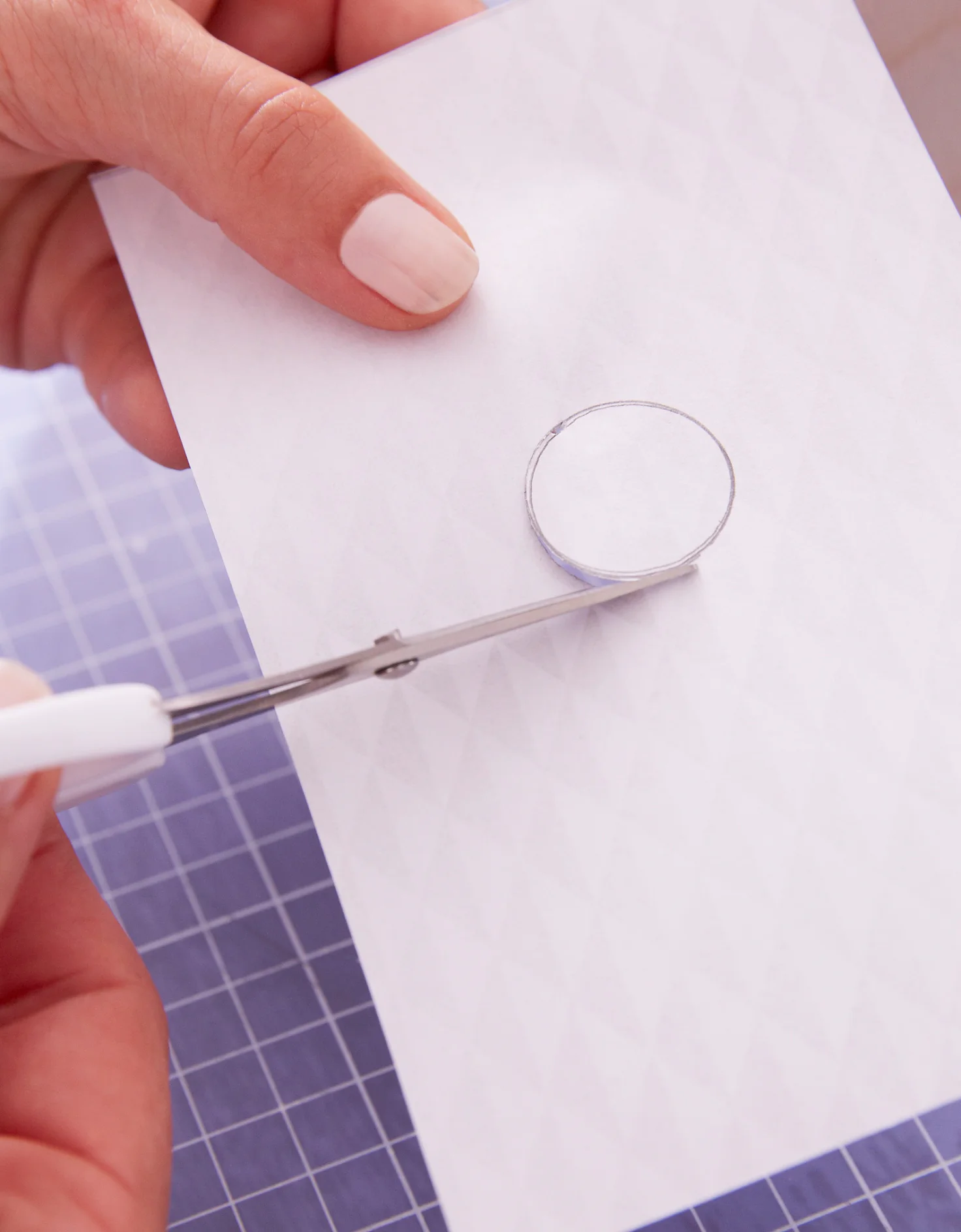 Place the paper on the corresponding surface - transfer holes or cut-outs onto the paper, and cut them out with small scissors.