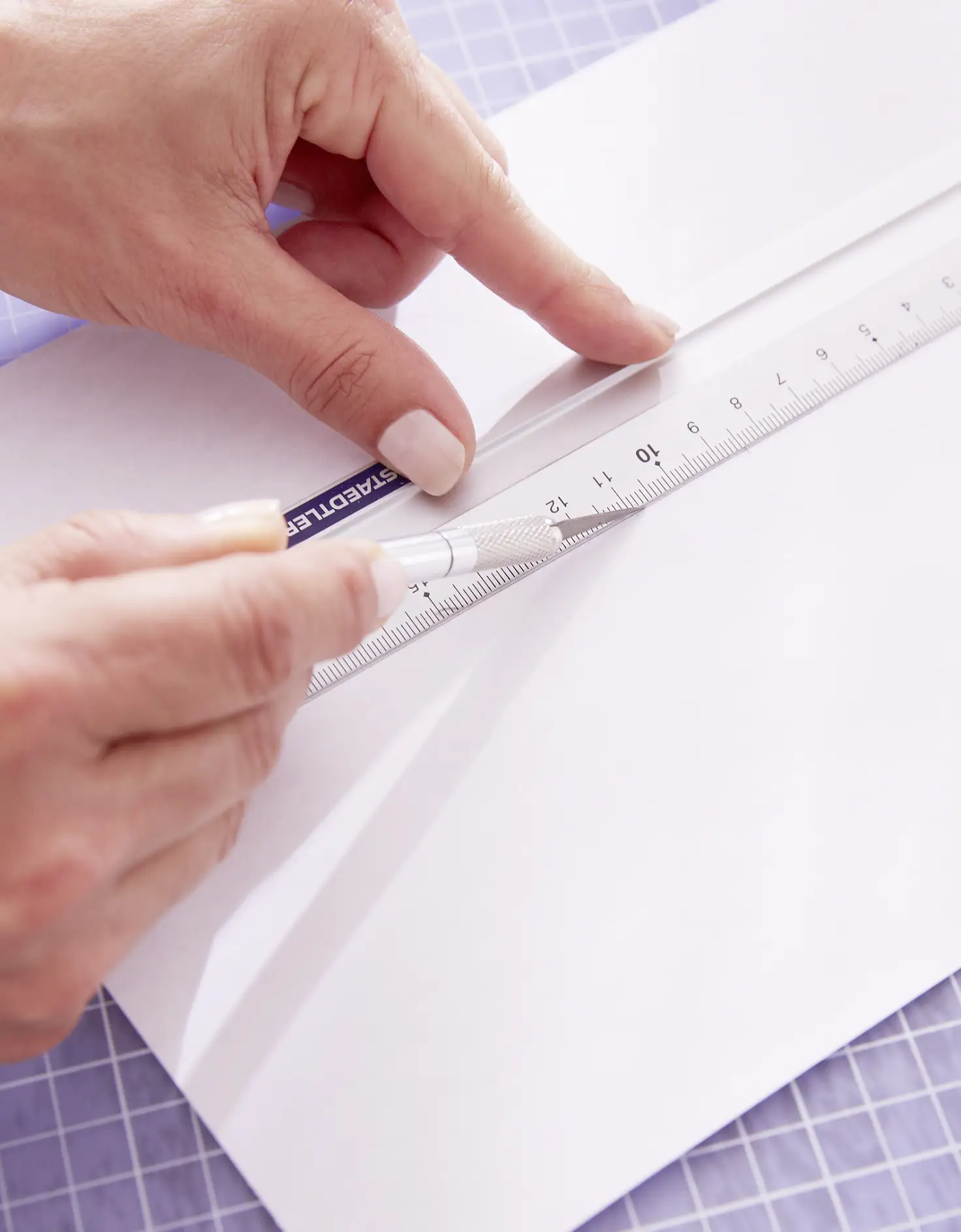 Measure the surfaces you wish to cover, and transfer the measurements to the back side of the paper. Cut paper.