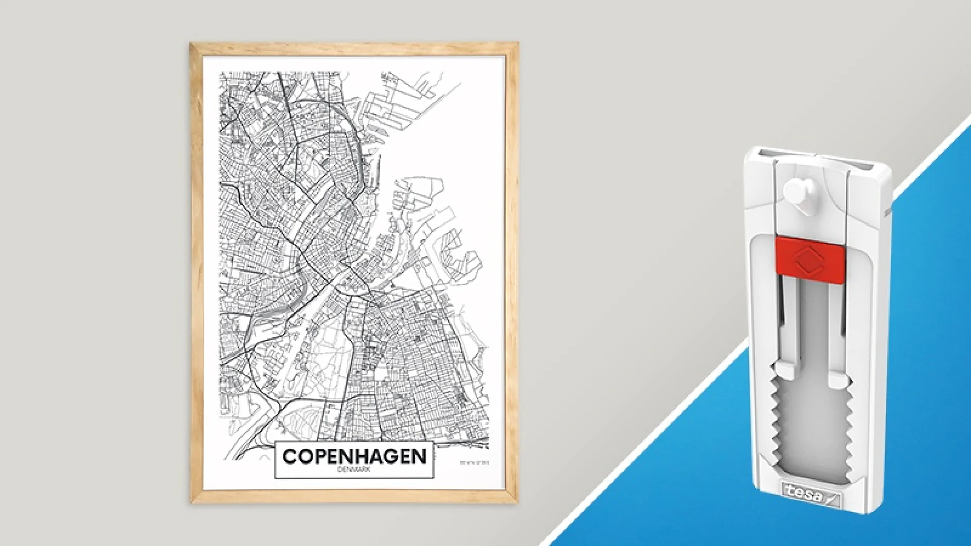 A framed map of Copenhagen, Denmark, is displayed on a white wall. Next to it on a blue surface is a white and red wall hanger featuring grooves and a hook for hanging items. (This text has been generated by AI)