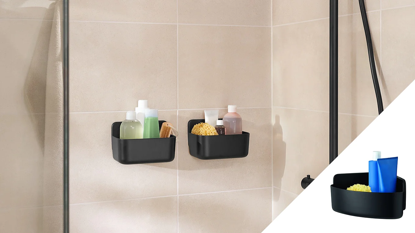 Two black wall-mounted shower caddies are attached to a tiled wall using tesa tape. They hold various bath items like bottles, a brush, and a sponge. The inset image shows the caddies with a blue bottle and a sponge. A black shower fixture is visible. (This text has been generated by AI)