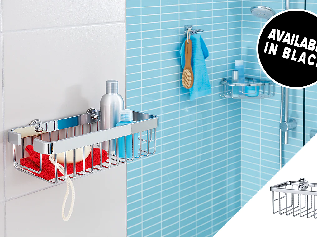 A bathroom scene with a chrome shower caddy holding shampoo, a sponge, and a red cloth. The caddy is mounted on blue tiled walls using tesa tape. An inset shows a black version of the caddy. A label reads Available in Black. (This text has been generated by AI)