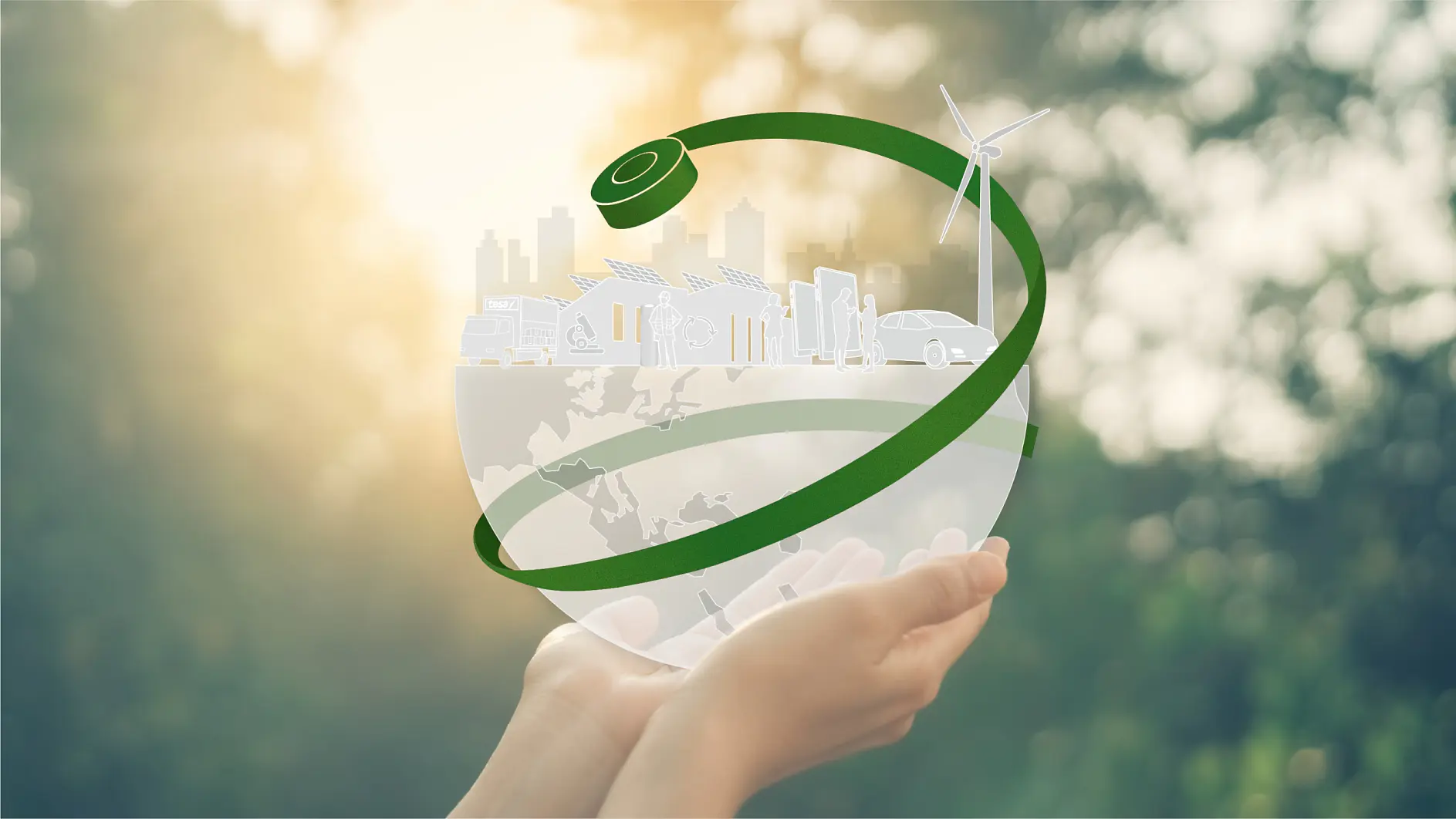 Hands holding a transparent globe with eco-friendly icons, including wind turbines, solar panels, and an electric vehicle. A green band of tesa tape encircles the globe. Cityscape in the background with sunlight filtering through trees. (This text has been generated by AI)