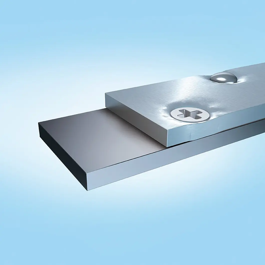 A 3D rendering of two rectangular metal plates stacked on each other, with a tesa tape fastening them at the top right corner, set against a light blue background. (This text has been generated by AI)