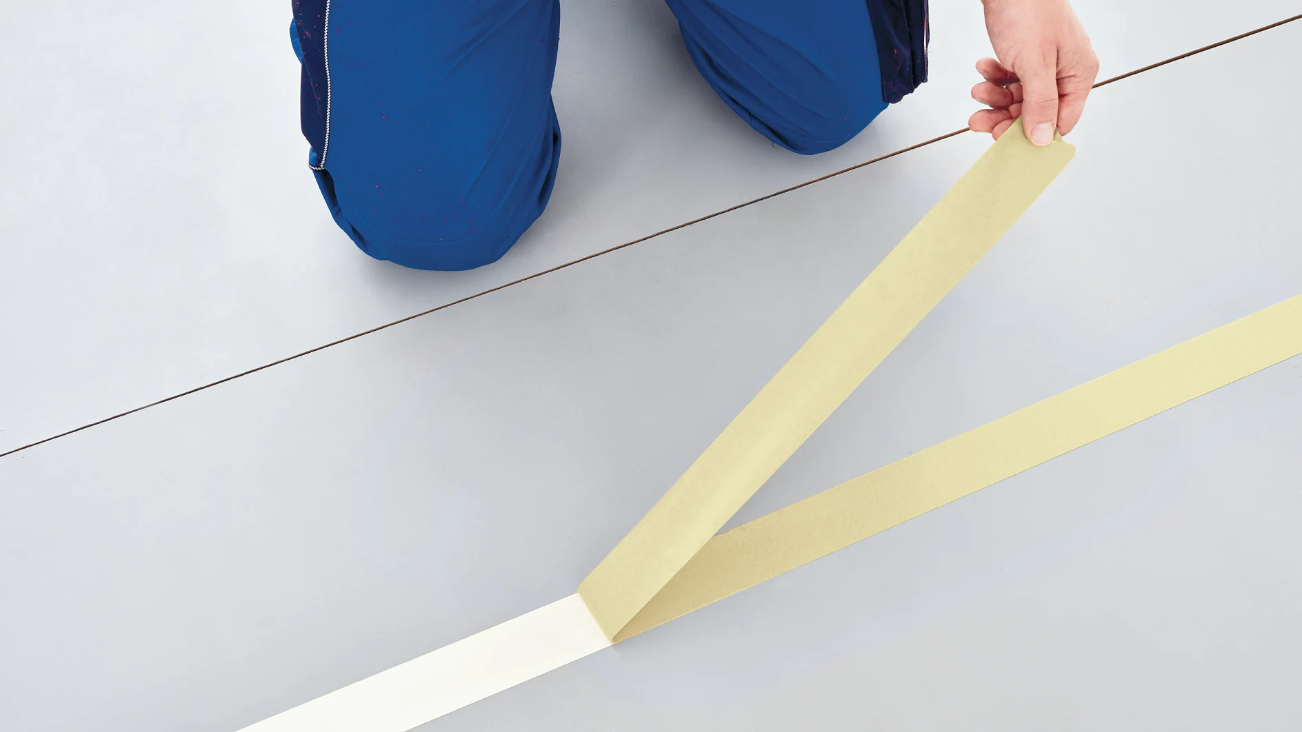 Application of tesa® 5939 White Carpet Tape: Step 2