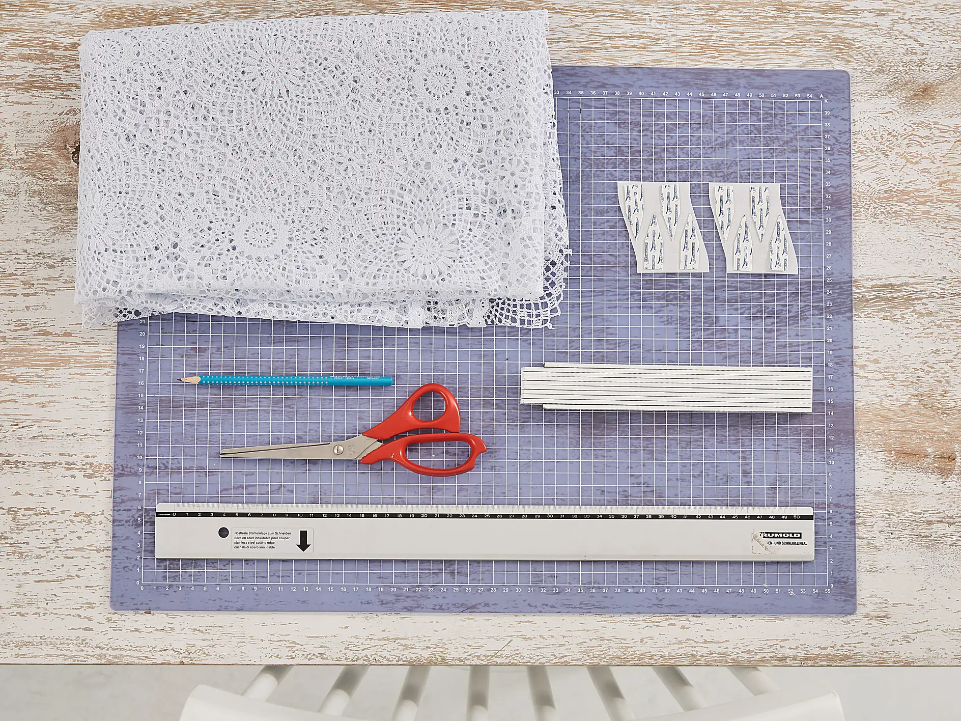 Overview of materials needed for a lace window treatment