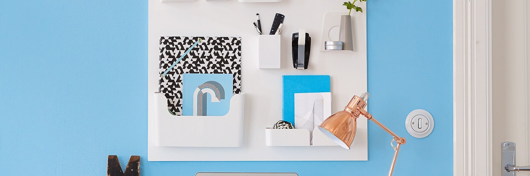 An organiser helps you get your life in order, and it's easier than you think to make. All you need is a wood panel and a few containers and shelves. And, thanks to tesa Powerbond®, you can be sure they'll all stick together.