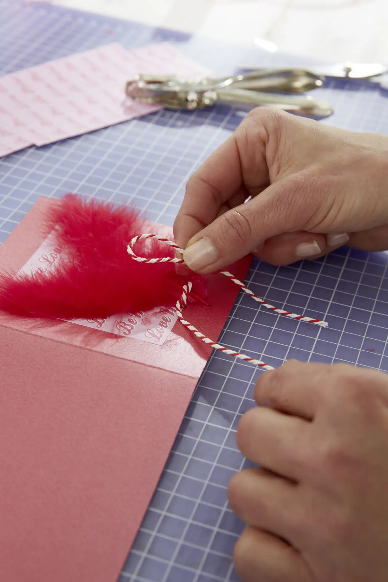 DIY Valentine's Card / Step 6: Pull ribbons through