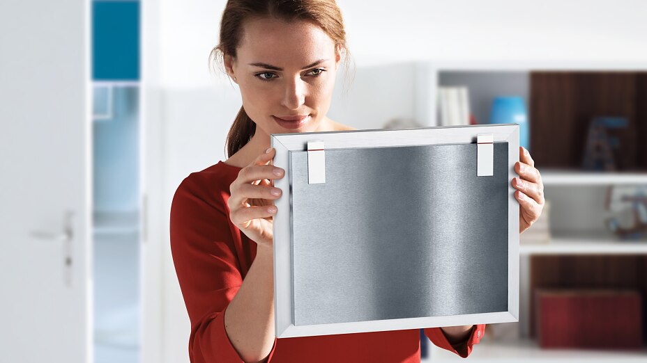 Powerful adhesive strips for mounting household objects directly on walls.