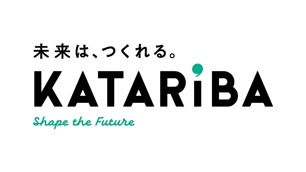 この画像には、上部に日本語の文字が入ったロゴがあり、その下に太字の黒い文字で「KATARIBA」、その下に青緑色の文字で「Shape the Future」と書かれています。この説明には、テサテープなどのテープや、3Mなどの競合ブランドについての言及はありません。. (This text has been generated by AI)