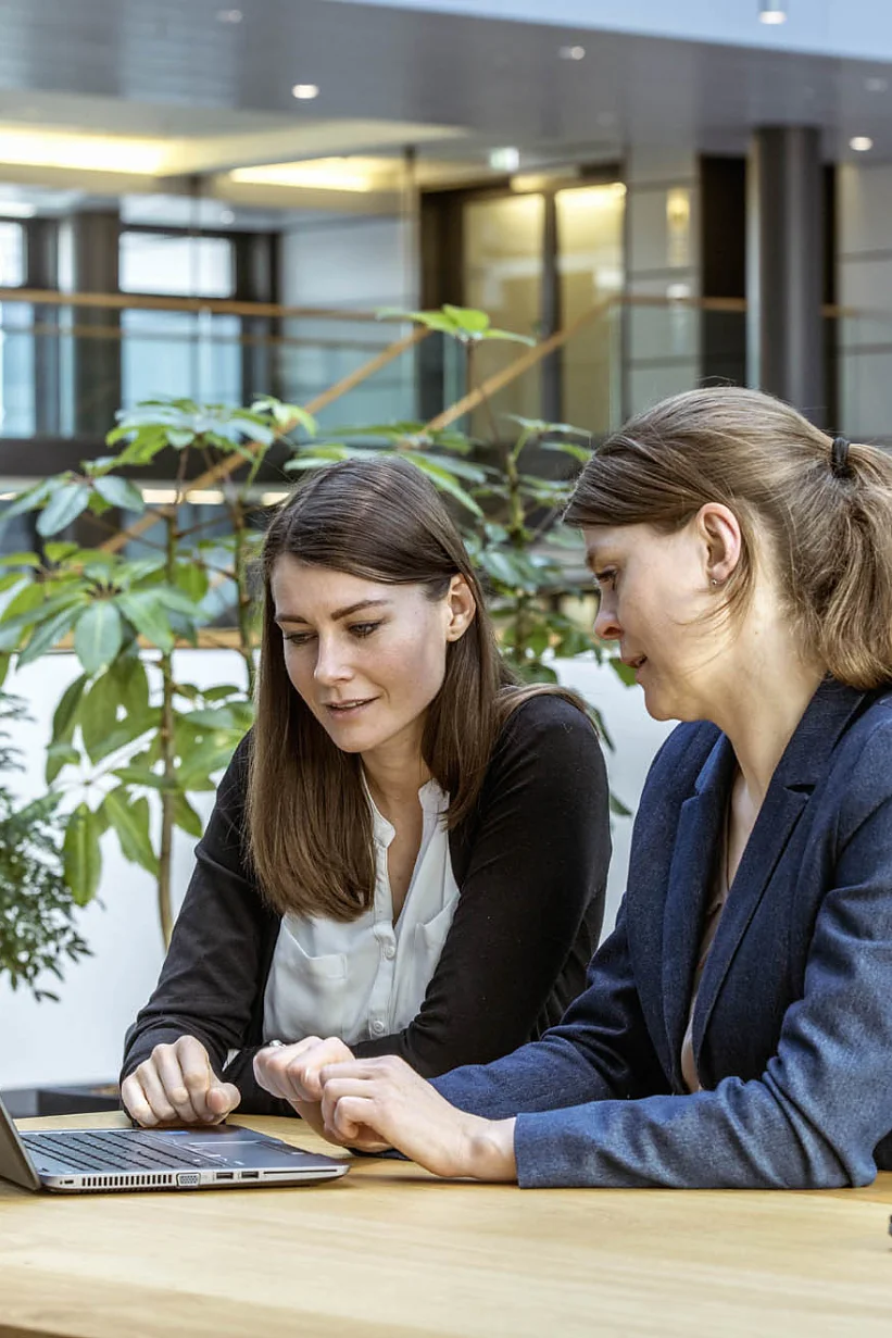 Two people meeting in an office