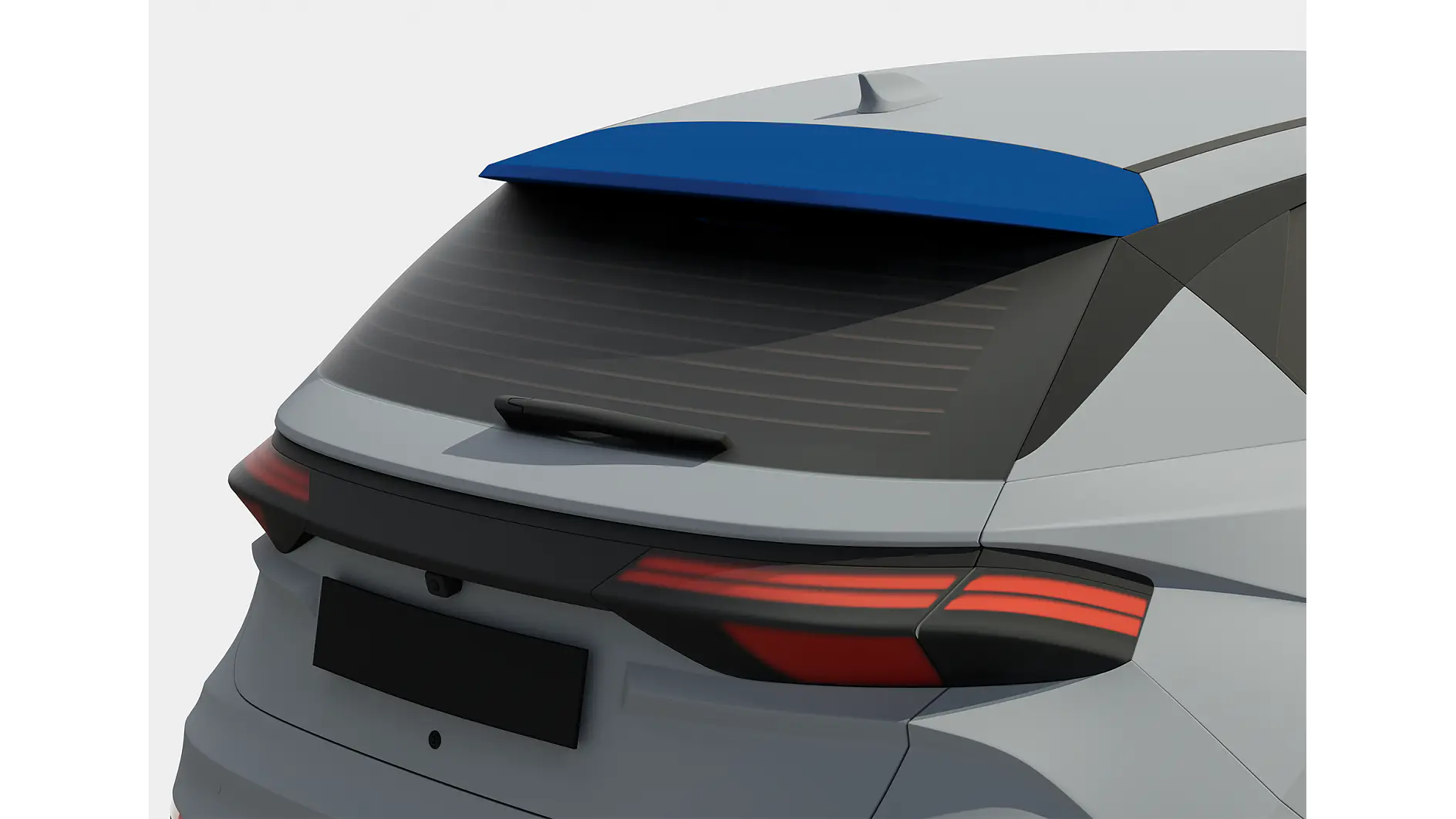 The image shows the rear view of a car with a blue spoiler. The car has tinted windows, sleek taillights, and a visible rear windshield wiper. tesa tape can be seen around the empty license plate area. The vehicle is mostly gray, with black trim detailing secured in place by tesa tape. (This text has been generated by AI)