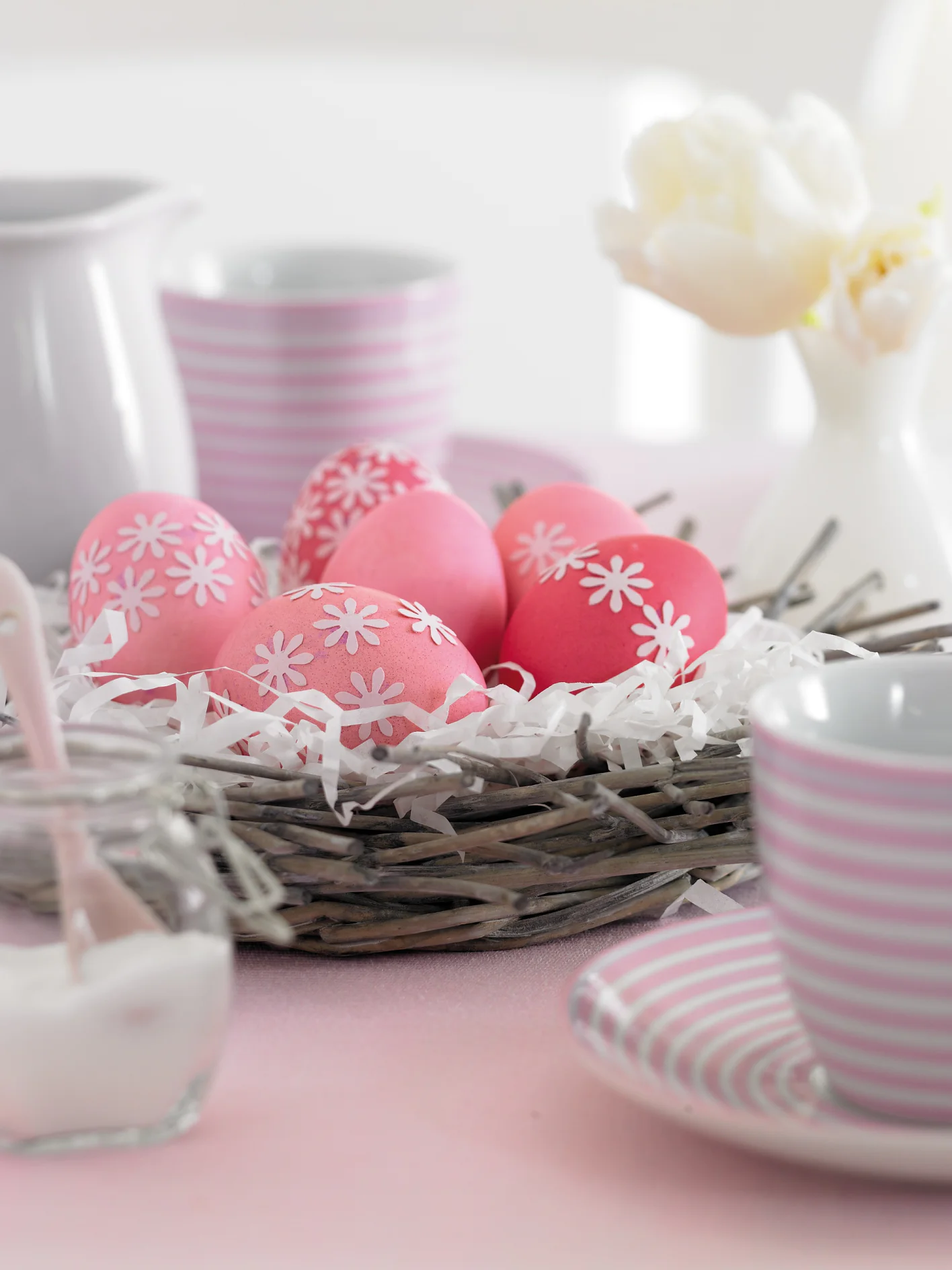 Isn't that lovely: Decorate your Easter eggs with punch-out paper flowers - they're easy to attach.