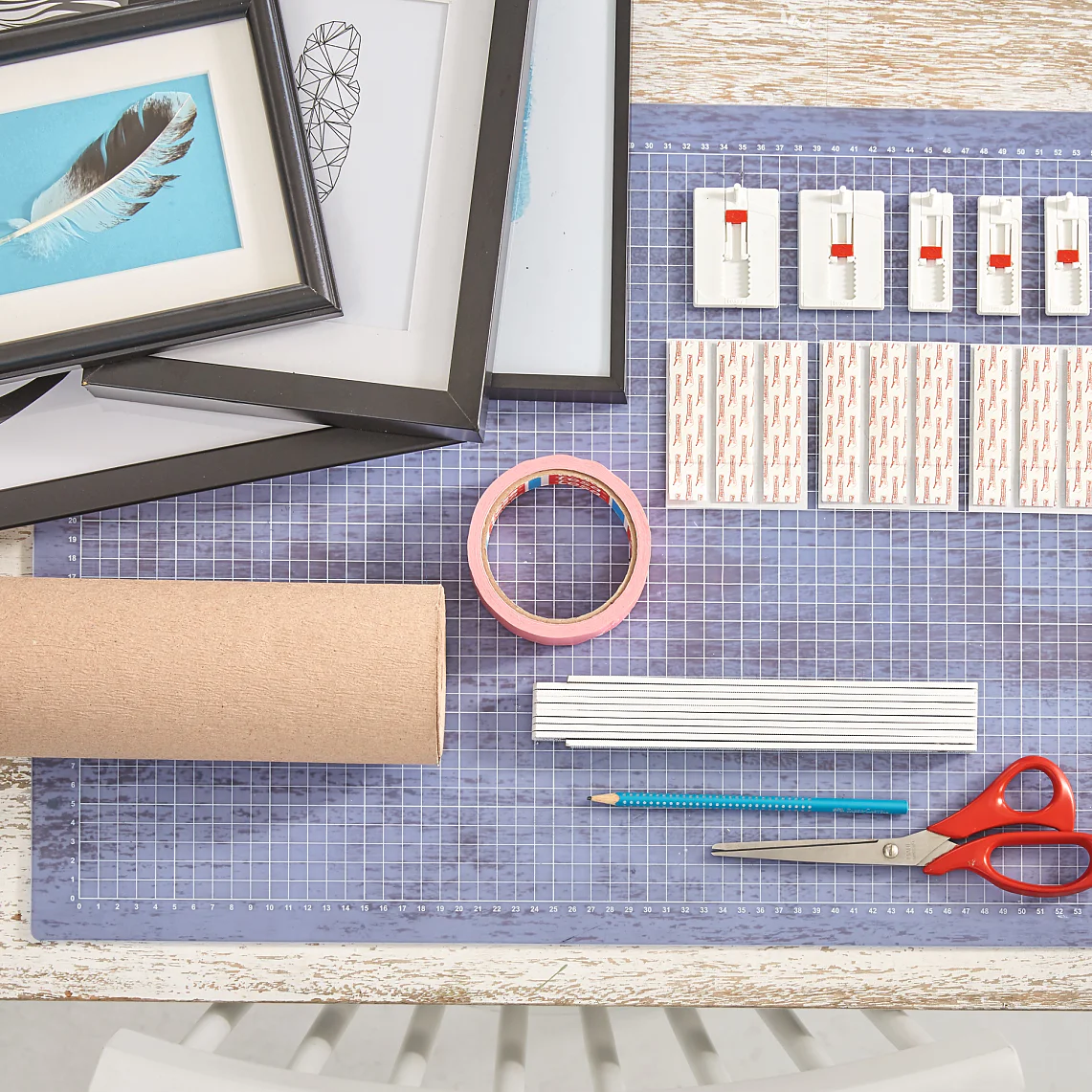 Overview of materials needed for our feather-themed wall collage