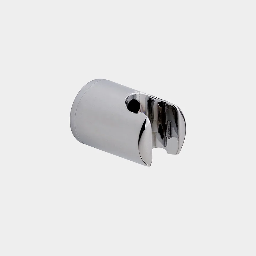 A metal wall mount bracket with a cylindrical shape and a semicircular groove. It has two circular holes on its surface for attachment using tesa tape, and it boasts a shiny chrome finish. (This text has been generated by AI)