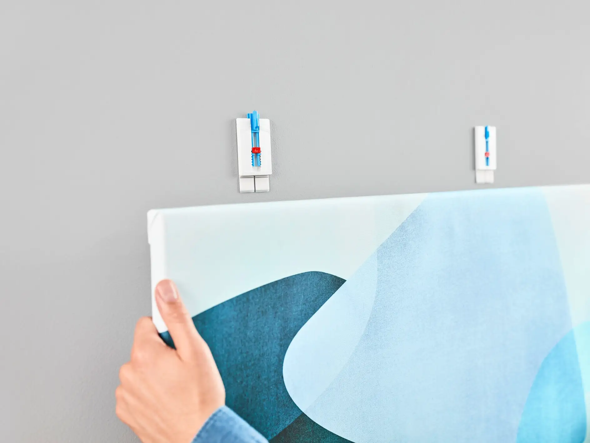 [en-en] tesa SMS adjustable nail for canvas for wallpaper up to 2kg, step 5 of 6
