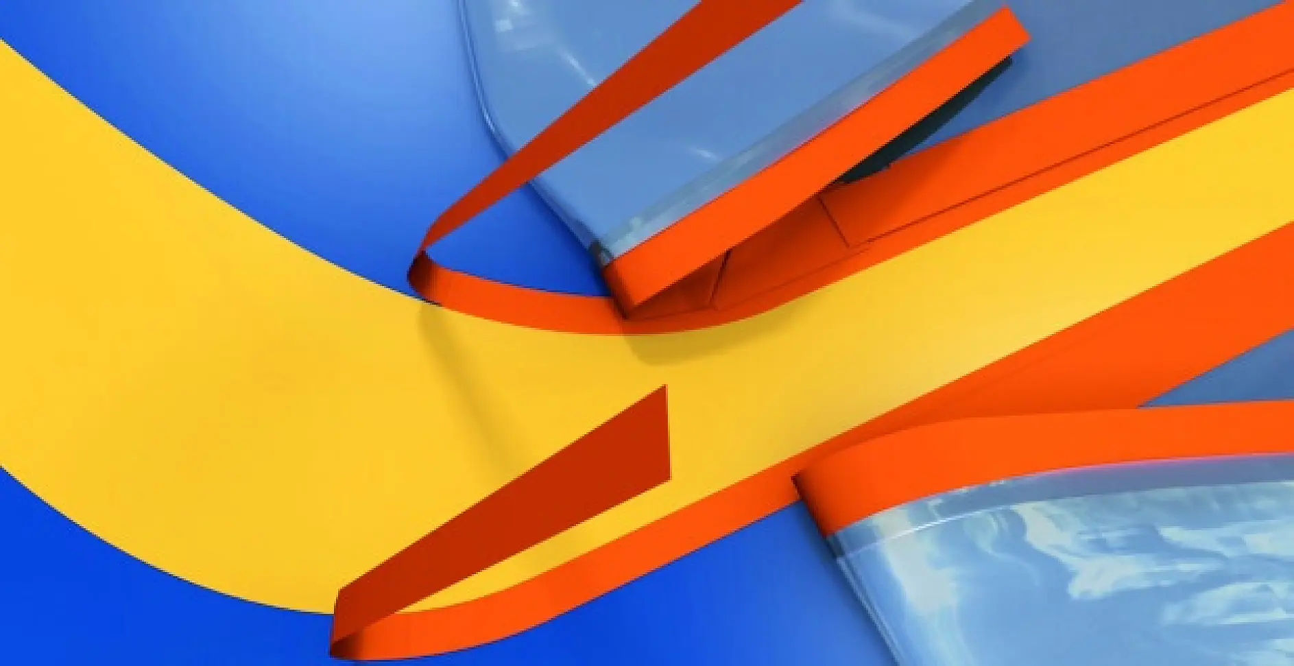 tesa adhesive tape rolls and strips in red and orange on a blue and yellow surface, arranged diagonally in an indoor setting (This text has been generated by AI)