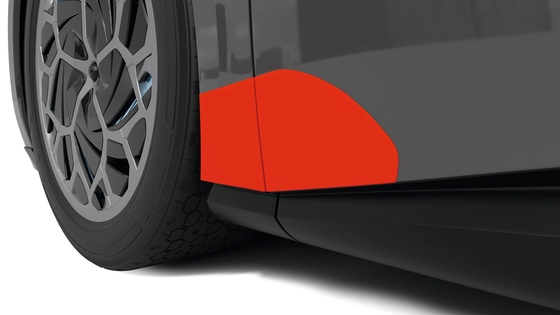 close-up weergave van de sideskirt van een auto met een rood accent bij de wielkast op een gestroomlijnde zwarte carrosserie. (This text has been generated by AI)