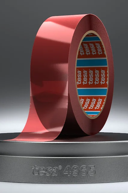 A roll of shiny red tesa tape is displayed upright on a round, dark grey stand with 1968 engraved on it. The inner core of the tesa tape has a blue design with red and white text. The background is a gradient of grey. (This text has been generated by AI)