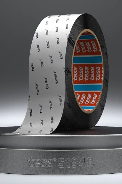 A roll of Intel 8048 labeled tesa tape, partially unrolled, stands on a round black platform. The inside of the tesa tape is orange with text, and the exterior has a repeating Intel 8048 pattern. The background is a subtle gray gradient. (This text has been generated by AI)