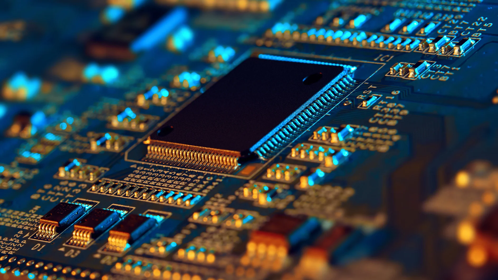 close-up of a black microchip mounted on a blue printed circuit board with various electronic components and gold connectors (Acest text a fost generat de inteligența artificială)