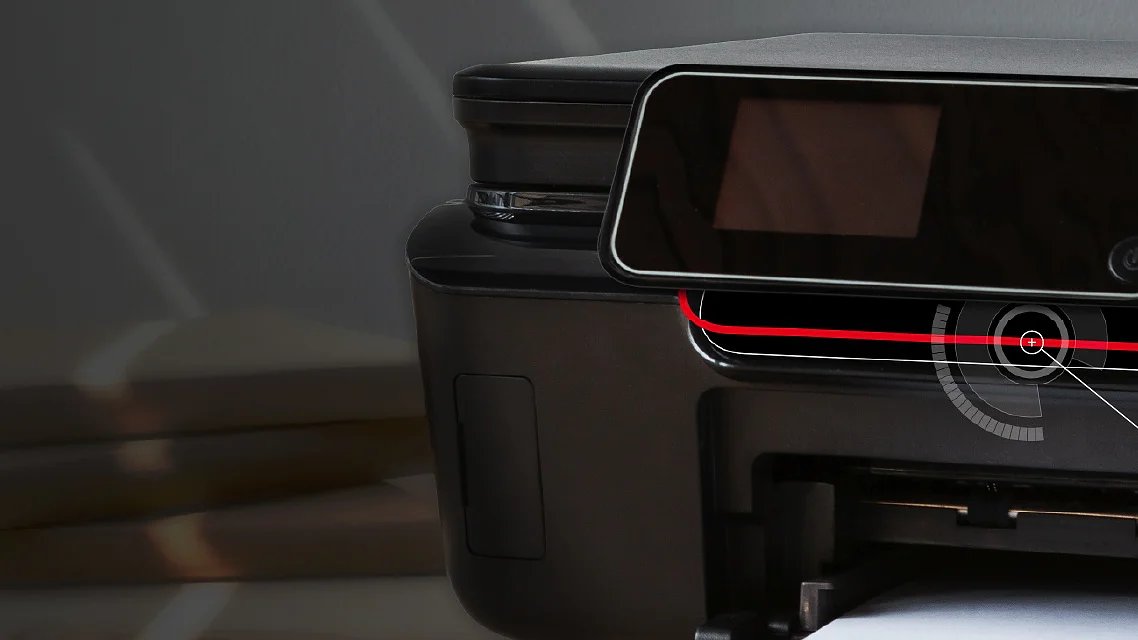 A close-up of a black printer with a clear tesa tape sticker applied to its control panel, highlighted by a red outline. A label points to the tesa tape sticker, noting its strong peel-adhesion on plastic housings. (Acest text a fost generat de inteligența artificială)