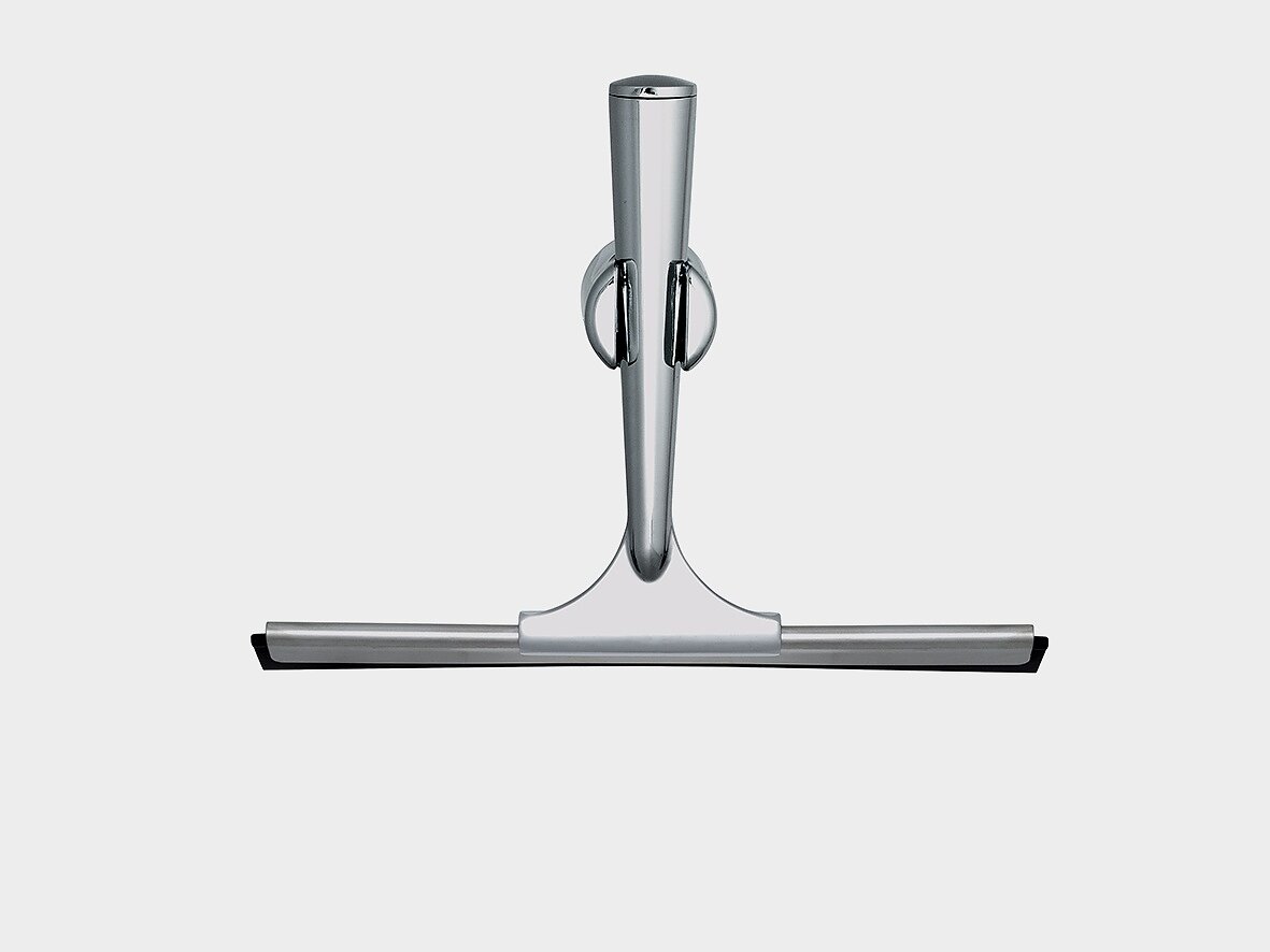A metallic shower squeegee with a sleek, modern design. It has a stainless steel handle and a flat rubber blade for wiping surfaces. The handle features a hanging ring for easy storage. The background is plain and light gray, with tesa tape prominently used to secure the squeegee in place for optimal convenience. (This text has been generated by AI)