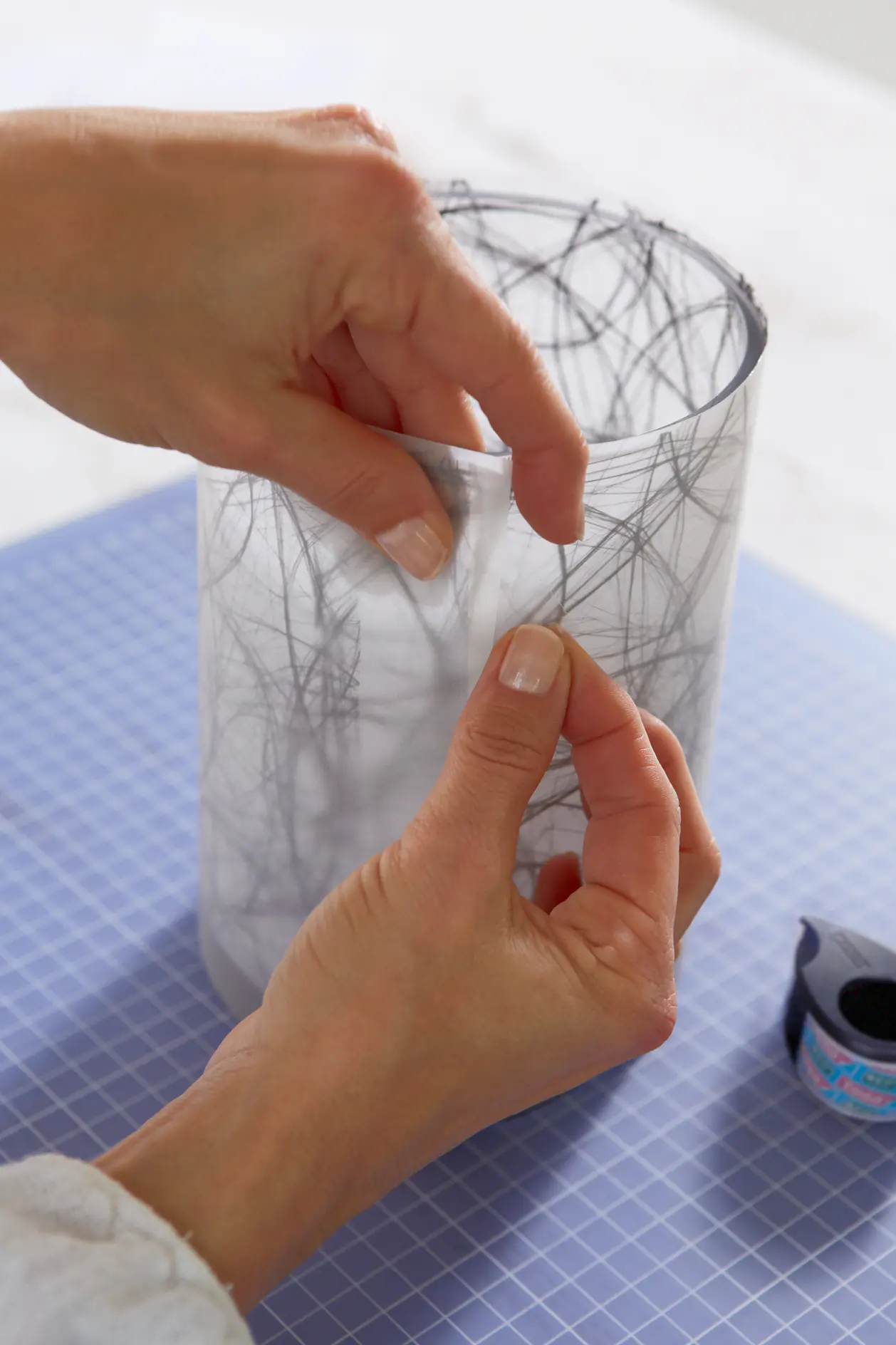 Cut transparent paper to size and glue firmly.