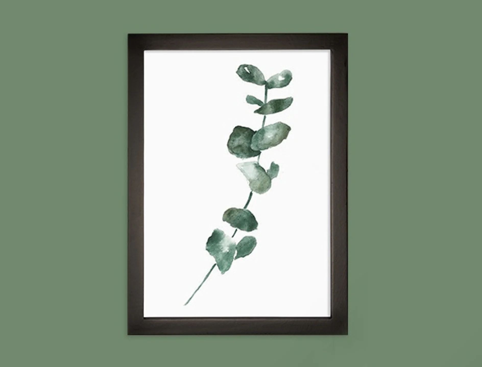 En akvarellmålning av en grön lummig stjälk visas i en svart ram mot en grön bakgrund. Stjälken har flera små blad längs sin längd, hållna säkert med tesa-tejp. (This text has been generated by AI)