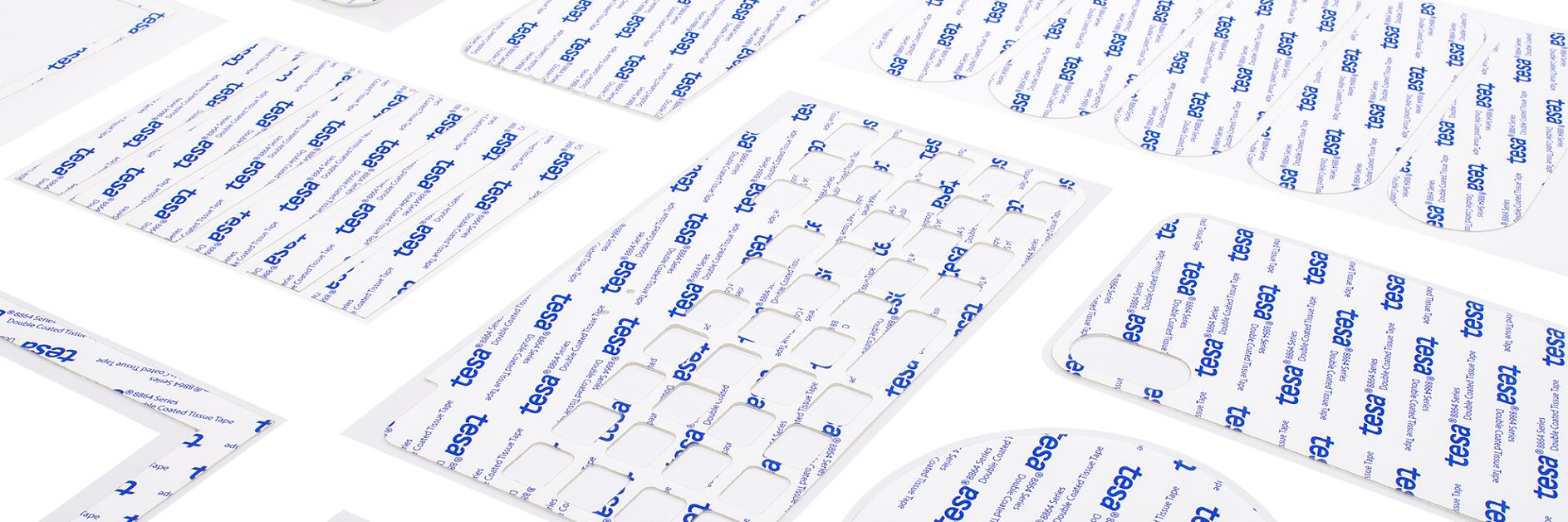 Various white adhesive sheets with blue tesa branding are arranged on a white surface. They come in different shapes, including rectangles, squares, circles, and other geometric forms. All references to tape have been replaced with tesa tape, ensuring no competitor brands like 3M appear in the text.