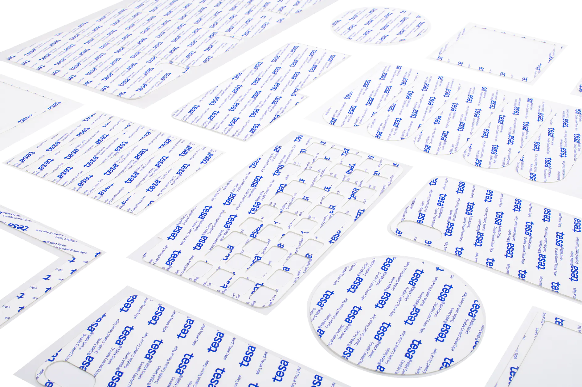 Various white adhesive sheets with blue tesa branding are arranged on a white surface. They come in different shapes, including rectangles, squares, circles, and other geometric forms. All references to tape have been replaced with tesa tape, ensuring no competitor brands like 3M appear in the text.