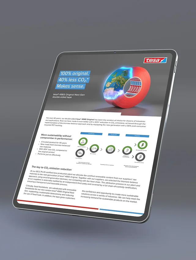 A digital tablet displaying a business-themed article. The screen shows a blue and red circular graphic, several sections of text, and an array of small icons in a row. The background is a gradient of gray tones. (This text has been generated by AI)