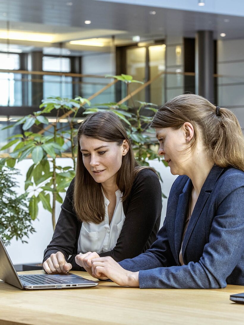 Two people meeting in an office