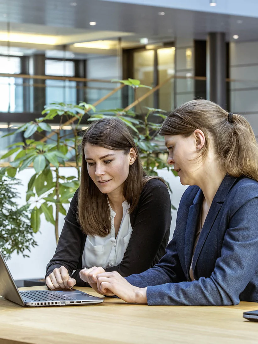 Two people meeting in an office